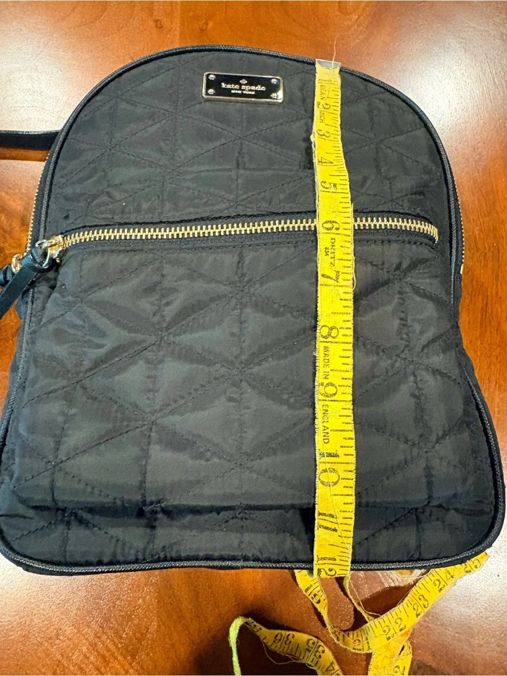 kate spade Black Quilted Med. Backpack, great condition